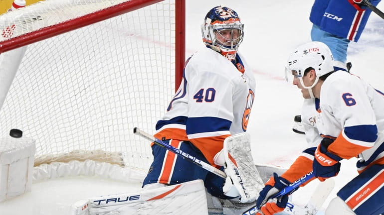 Islanders goaltender Semyon Varlamov is scored on by the Canadiens'...