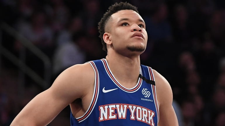 Knicks forward Kevin Knox II looks on during a free...
