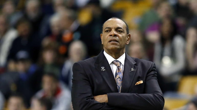 Nets coach Lionel Hollins watches from the sidelines in the...
