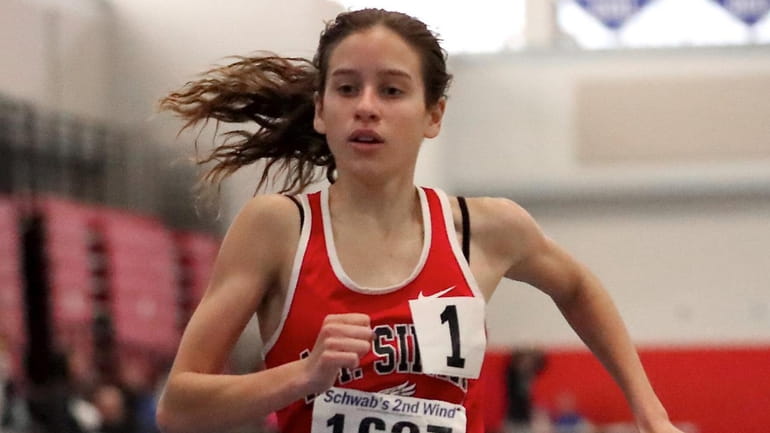 Mt. Sinai's Sarah Connelly wins the 1,500-meter run during the...