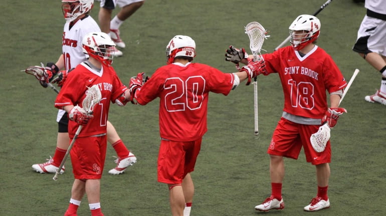 From left, Stony Brook's Mike Rooney, Jeff Tundo and Brody...