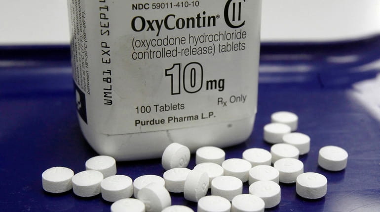 FILE - This Feb. 19, 2013, file photo shows OxyContin...