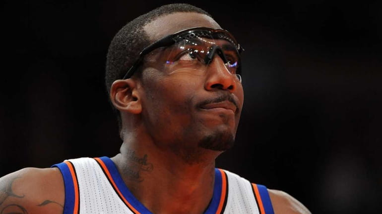 New York Knicks center Amar'e Stoudemire (1) looks at the...