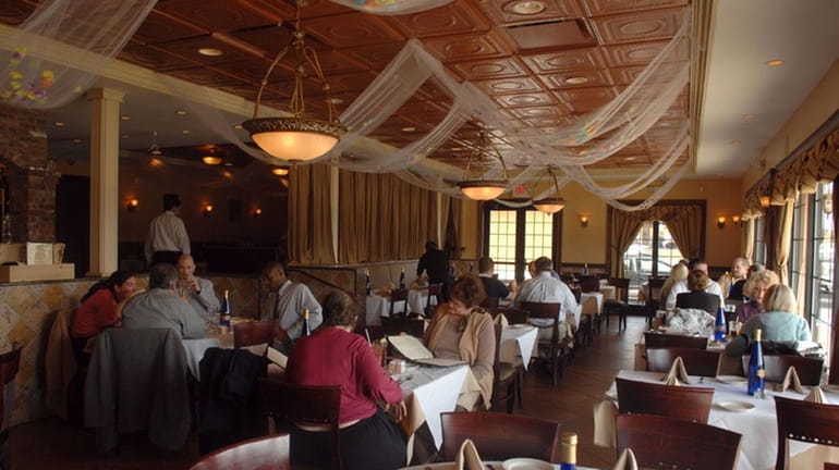 The dining room at Cafe Formaggio in Carle Place