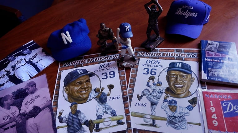 A selection of Nashua Dodgers memorabilia is displayed at City...
