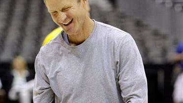 Former NBA player Steve Kerr reacts while participating in a...