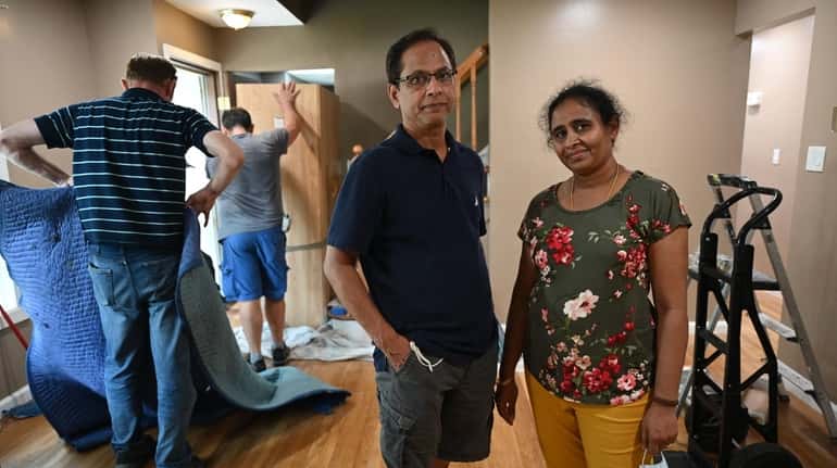 Harisankar and Tanuja Rasaputra at their new home in Smithtown as...