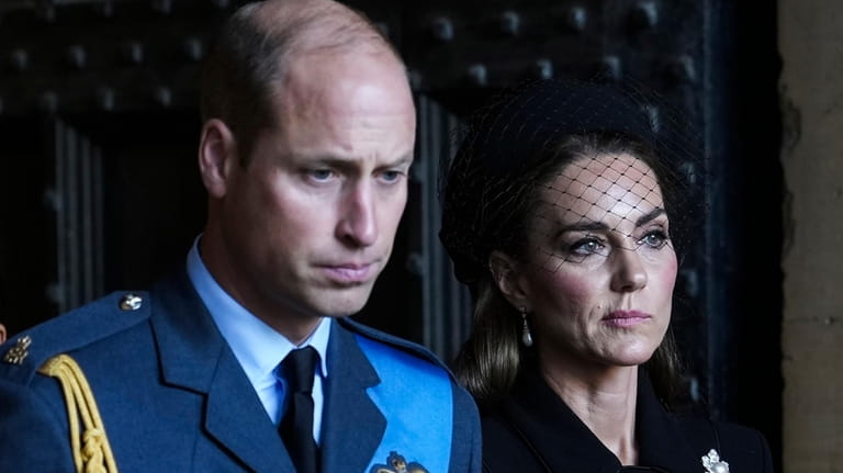 Britain's Prince William and Kate, Princess of Wales leave after...