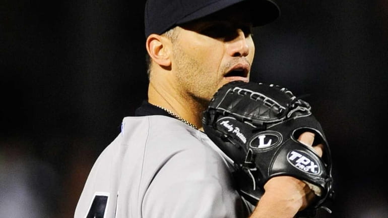 Andy Pettitte looks in for the sign during Game 2...