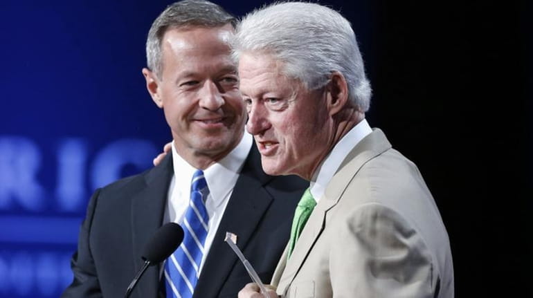Former Maryland Gov. Martin O'Malley with former President Bill Clinton...
