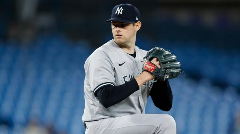 Jordan Montgomery #47 of the Yankees pitches in the second inning...