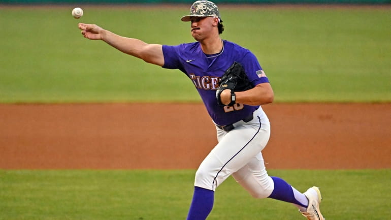 LSU starting pitcher Paul Skenes (20) pitches against Mississippi State...