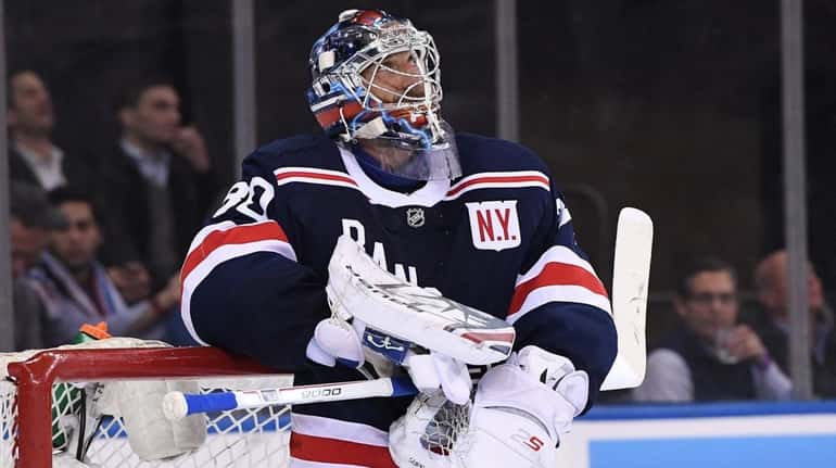 New York Rangers goaltender Henrik Lundqvist looks on after Toronto...