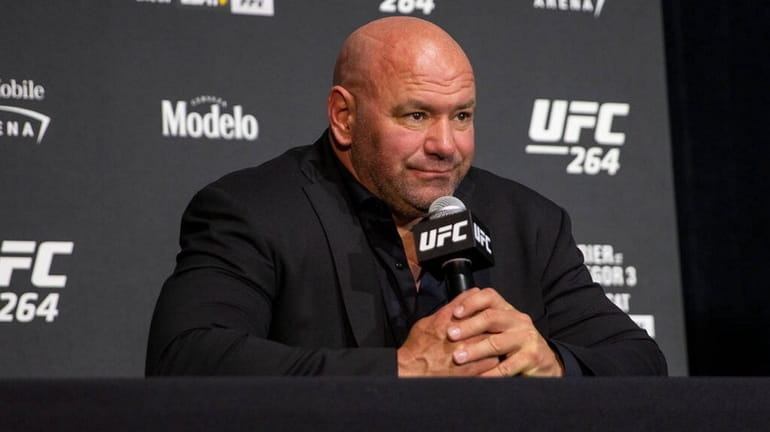 UFC president Dana White answers questions during a post-fight news...