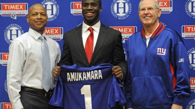 New York Giants first-round draft pick Prince Amukamara poses with...