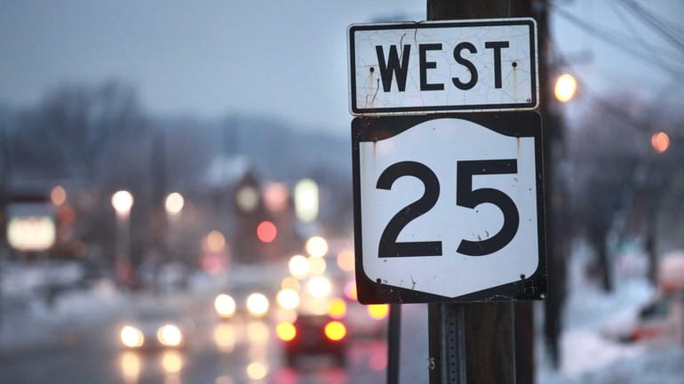 A Route 25 sign marks westbound Jericho Turnpike in Huntington...