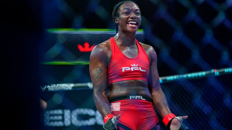 Claressa Shields reacts after winning a Professional Fighters League mixed...