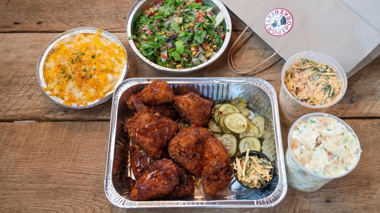 "Vagabond" fried chicken with sides at the Portly Porker, a...