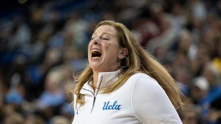 UCLA head coach Cori Close yells instructions during the first...