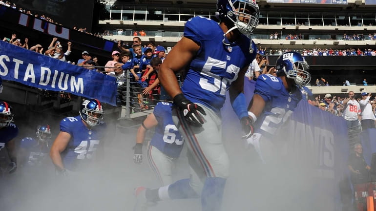 Spencer Paysinger of the New York Giants takes the field...