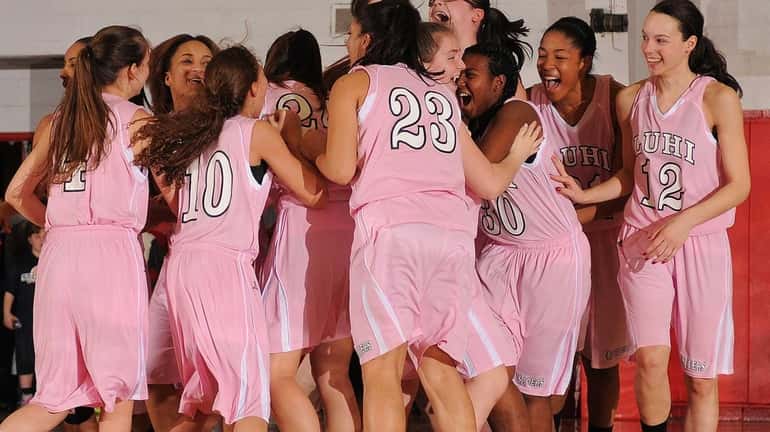 Long Island Lutheran girls basketball teammates celebrate after their 49-44...