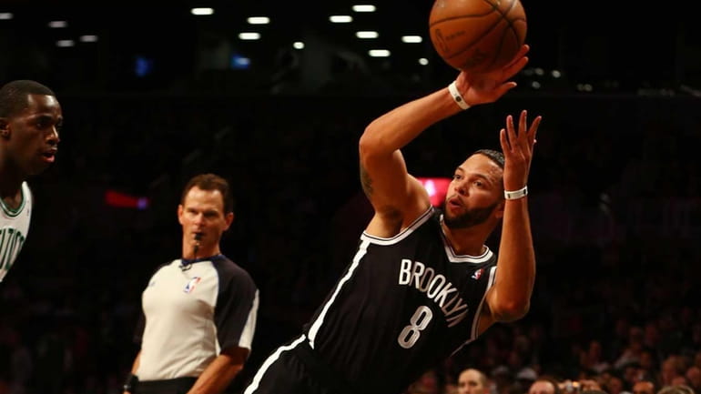 Deron Williams keeps the ball in bounds during a preseason...