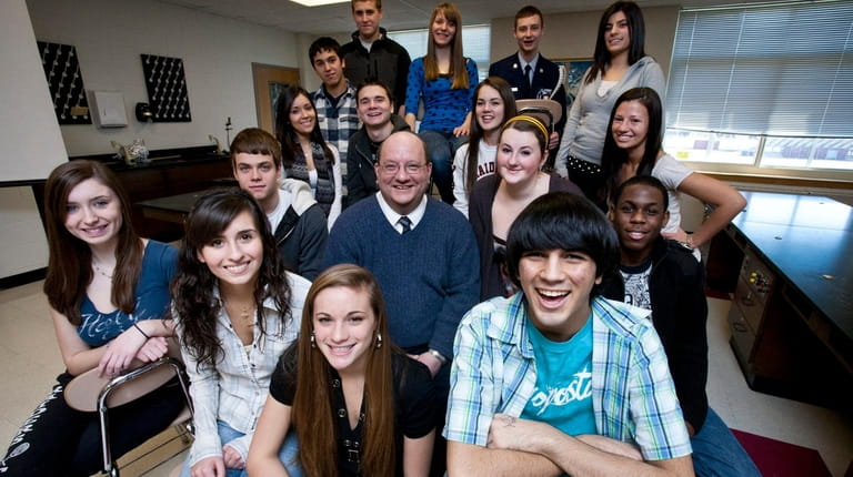 Saad Amer, front, with Patchogue-Medford High School students who won $80,000...