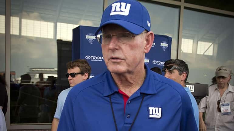 Giants head coach Tom Coughlin is seen after practice at...