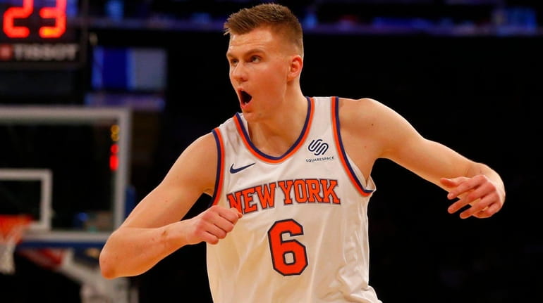 Kristaps Porzingis of the Knicks reacts in the first half...