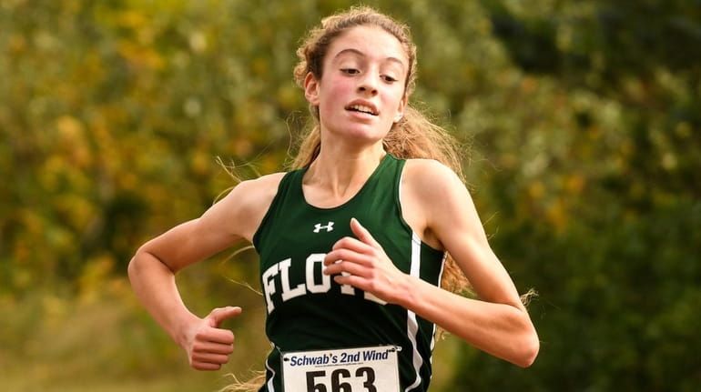 Floyd's Zariel Macchia finished first with a time of 18:52.4...