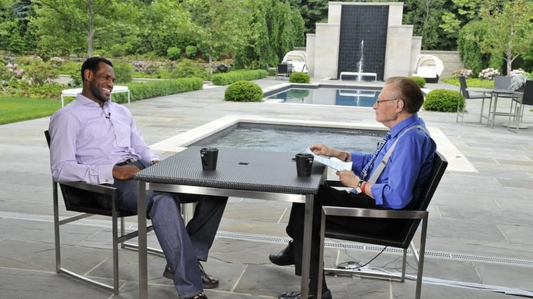 CNN's Larry King interviews basketball star LeBron James at his...