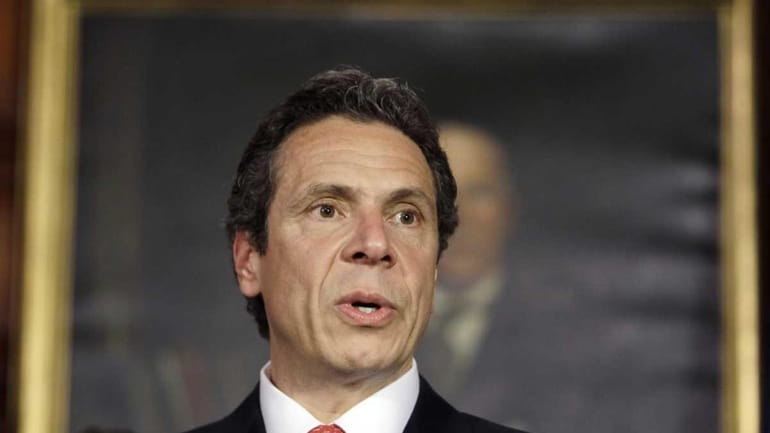 Gov. Andrew Cuomo speaks during a news conference on property...