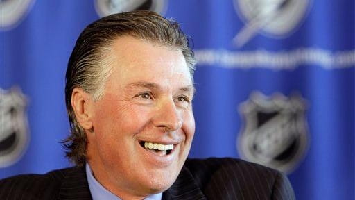 Tampa Bay Lightning head coach Barry Melrose laughs during a...