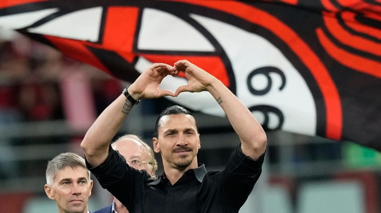 AC Milan's Zlatan Ibrahimovic reacts after his last game for...
