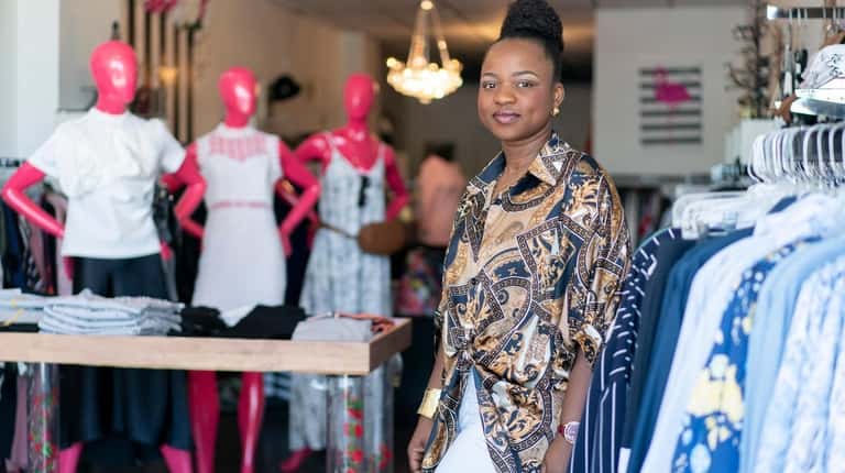 Sagine Pierre Charles, 40, owner of three-year-old women's clothing boutique...