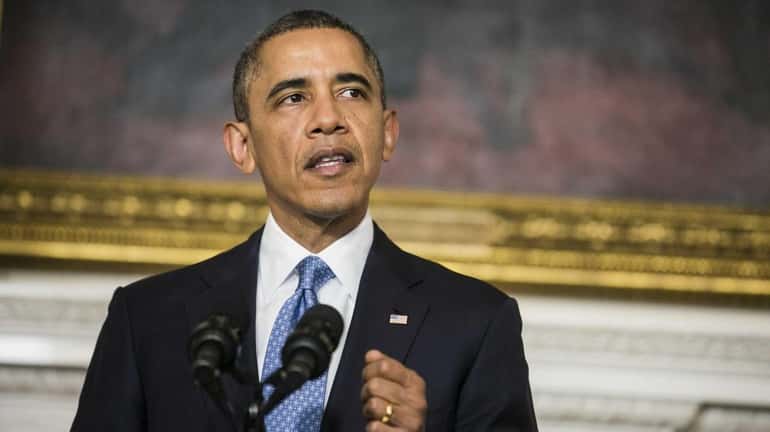 President Barack Obama makes a statement announcing an interim agreement...