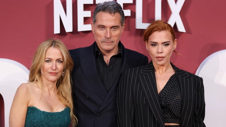 Gillian Anderson, from left, Rufus Sewell and Billie Piper pose...