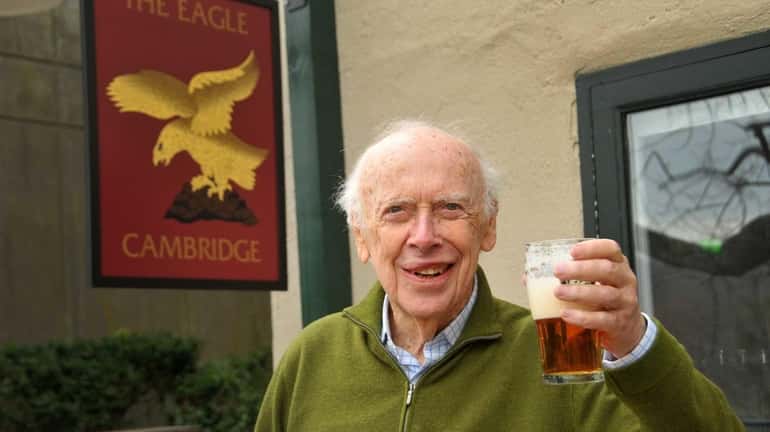 Dr. James Watson, a co-discoverer of DNA's double helix, sips...