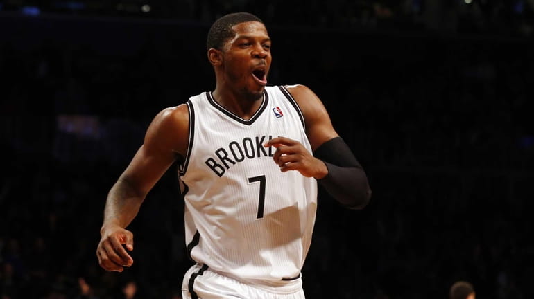 Joe Johnson of the Nets celebrates after a basket in...