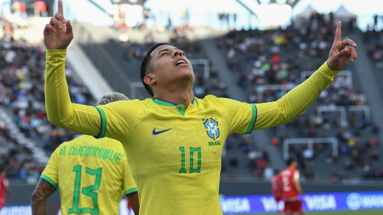 Brazil's Matheus Martins celebrates after scoring his side's third goal...