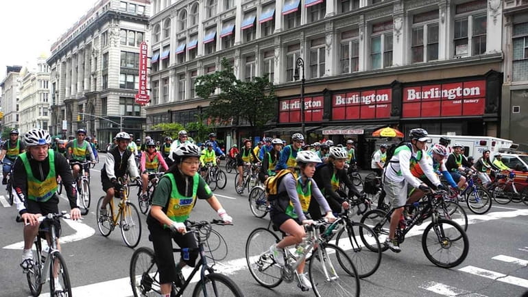 Some of the thousands of bicyclists participating in the Five...