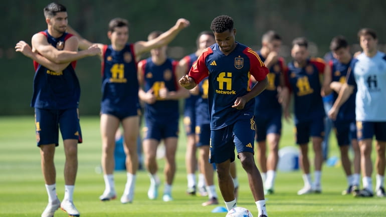 Spain's Ansu Fati works out during a training session at...