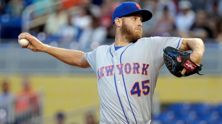 Mets' Zack Wheeler throws during the first inning against the...