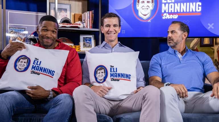 From left, Michael Strahan, Eli Manning and Shaun O'Hara on...