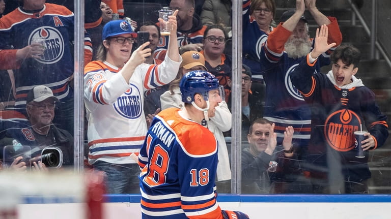 Edmonton Oilers' Zach Hyman (18) celebrates a goal against the...