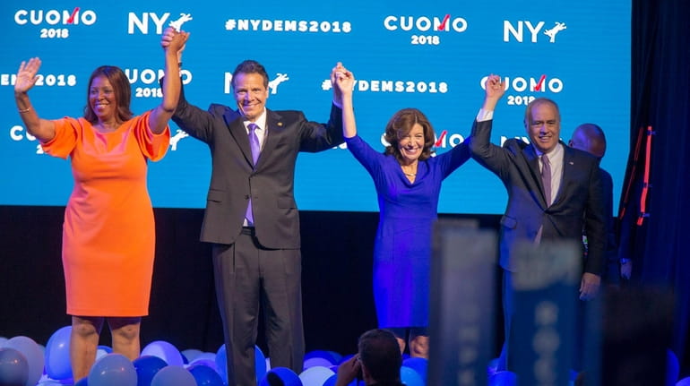 Andrew M. Cuomo, second from left, accepts the nomination for governor...