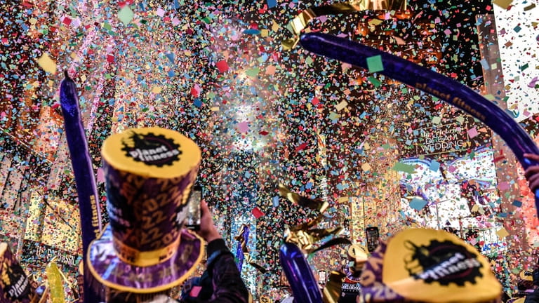 Revelers celebrate during a New Year's Eve celebration in Times...