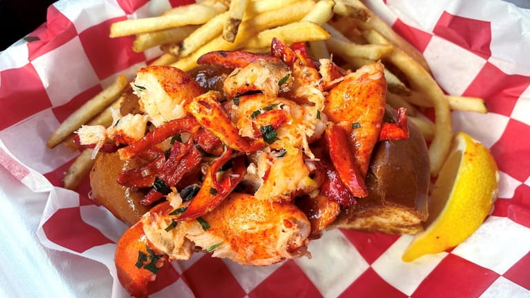 A warm Connecticut-style lobster roll and fries from Lazy Lobster...
