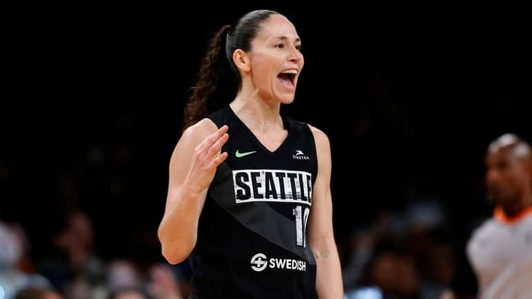 Seattle Storm guard Sue Bird (10) reacts after a three...