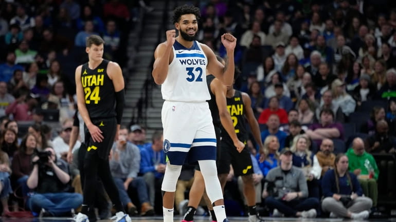 Minnesota Timberwolves center Karl-Anthony Towns (32) gestures after a foul...